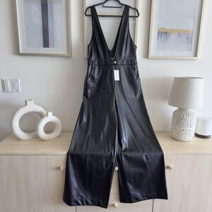 WeWoreWhat Overall Womens 32 Black Faux Leather Deep V Flare Jumpsuit Stretch